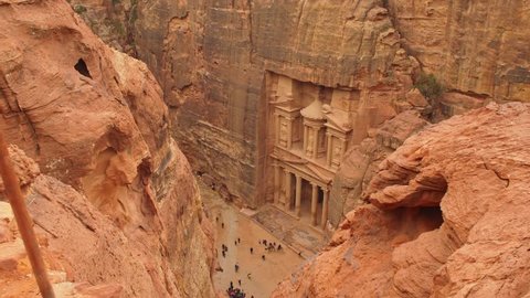 Top View of Petra Jordan Al Khazneh - the treasury, ancient city of Petra, Nabatean rock-cut temple of Hellenistic period of ancient Petra, originally known to Nabataeans as Raqmu - historical city