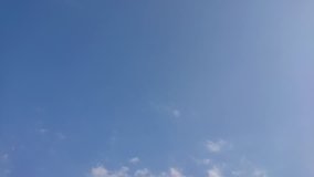 Cloud running across the blue sky. Nature concept. Video time lapse.
