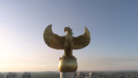 Astana, Kazakhstan - July 13, 2018: The statue of the Golden Eagle on the Independence Square of Kazakhstan