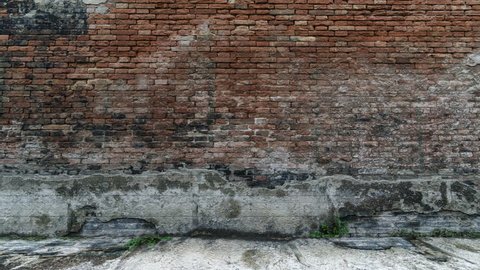 4K Animation of Broken Old Grunge Dirty Brick Wall with Green Screen. 3D Rendering