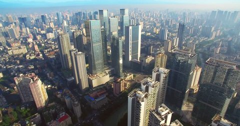 aerial photography of cityscape in chengdu sichuan china,residential buildings,office buildings crowded together in the morning sunshine and mist peacefully