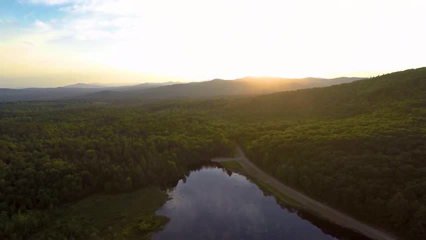 Aerial Sunset over Maine Mountains