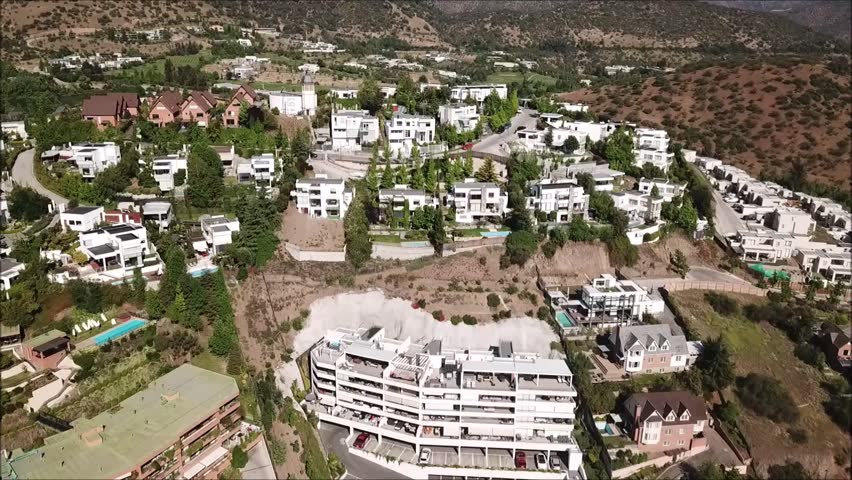 Aerial view of a city and mountain landscape