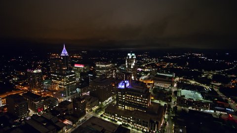 North Carolina Raleigh Aerial v5 Panning around from cityscape to downtown views at night 10/17