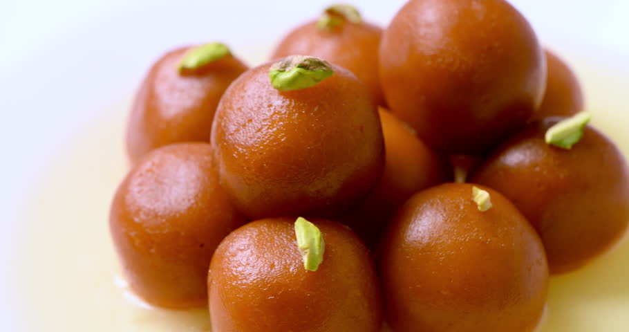 eating-gulab-jamun-stock-video-footage-4k-and-hd-video-clips