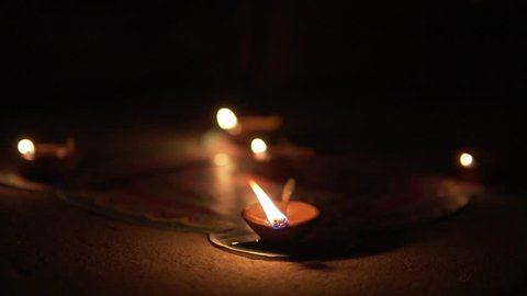 Traditional Indian lamps lit at night. Deepak Oil lamp. Diwali.