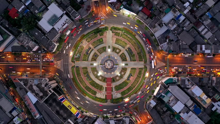 Traffic at Huge roundabout in Bangkok, Thailand, Timelapse, Aerial top view. Royalty-Free Stock Footage #1021634650