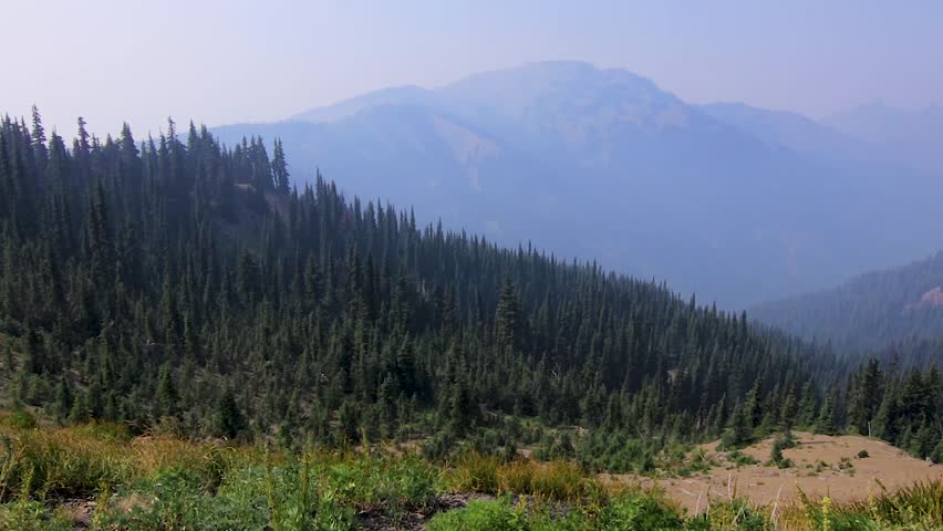 panning along the olympic mountain range in washington state on windy day