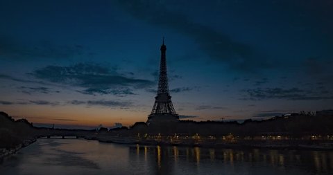Paris, France 20 August 2018 :Tour Eiffel Timelapse 4K Sunset with Clouds Moving Fast. Eiffel Tower in Paris Timelapse 4K.