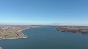 Blue color of Danube river under the clear sky 4K drone video