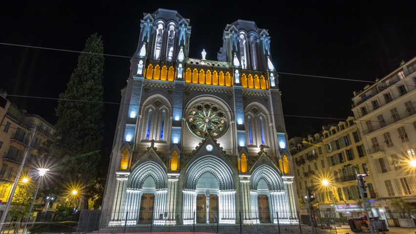 Basilique Notre-Dame de l Assomption at night located on Avenue Jean Medecin timelapse hyperlapse in Nice, France. Nice is the fifth most populous city in France and the capital of the Alpes-Maritimes