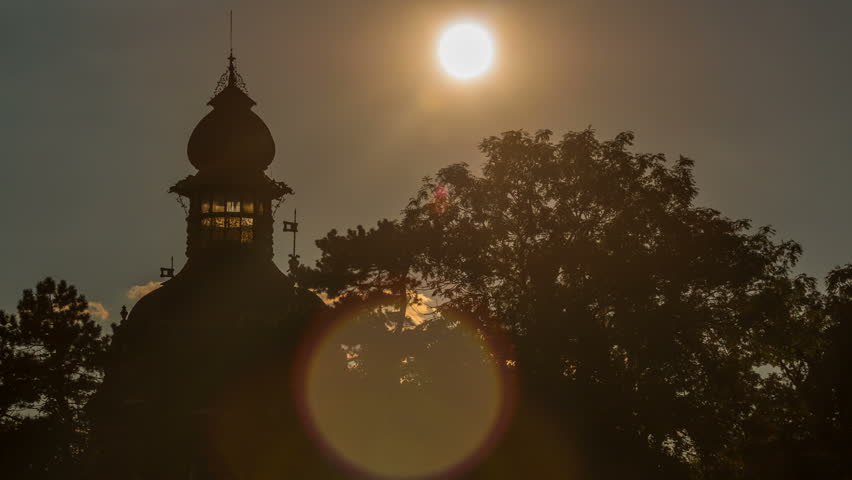 Baroque Hanavsky pavilion in Prague at sunset, Czech Republic. Sun goes down behing trees