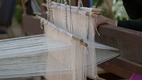 Hand weaving process at Assam , India