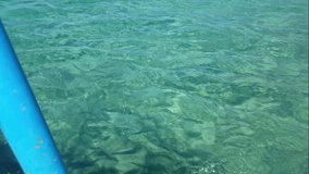 Footage of clear Mediterranean sea in the strait of Messina from the prospective of a fishing boat. Great footage for use in travel and tourism videos