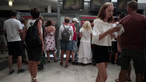 People in Helsingborg train station. Helsingborg, Sweden. August 2018.