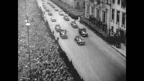 CIRCA 1930s - The Nazi occupation of Czechoslovakia and Austria is shown as well as Adolf Hitler being driven in a parade.