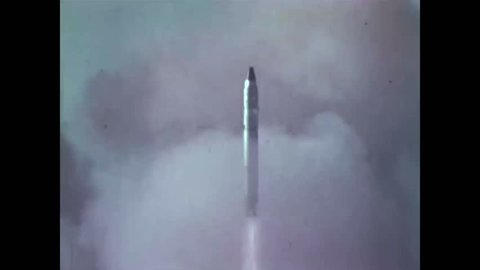 CIRCA 1970s - A model LGM-118 Peacekeeper intercontinental ballistic missile is shown as well as an LGM-30G Minuteman III with a crew in a silo.