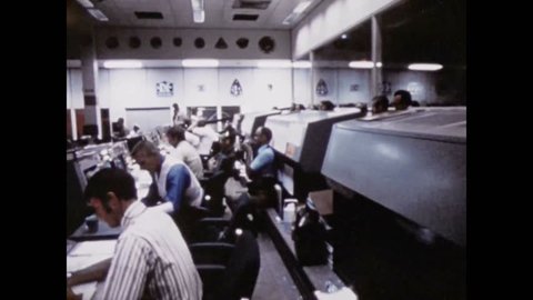 CIRCA 1970s - The Lyndon B. Johnson Space Center is shown as well as Apollo 15 astronauts driving the Lunar Rover.