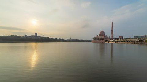 Time lapse of a mosque by a lake with reflection before sunset in Putrajaya, Malaysia. Prores 1080p.