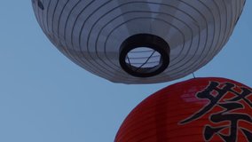 Tight Shot of Japanese Lanterns Moving in the Wind in 4K