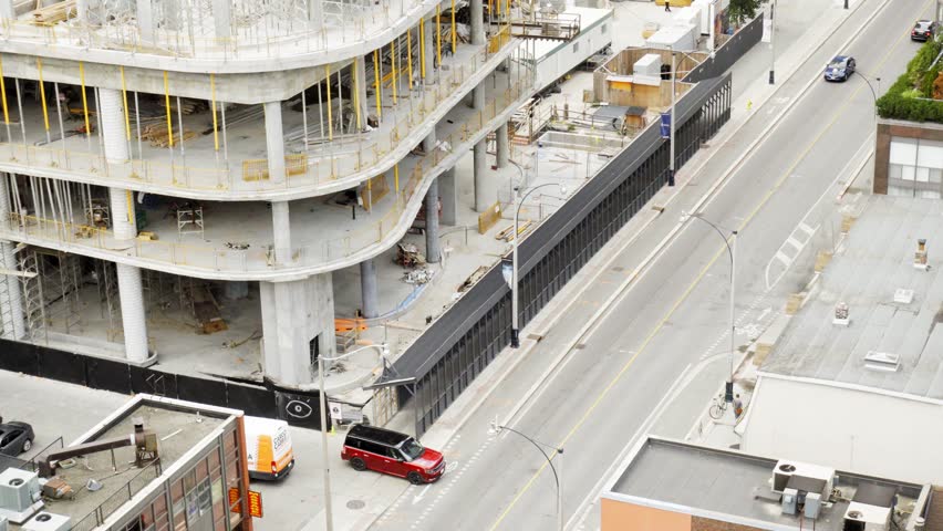 Under construction building by road, Toronto, Canada
