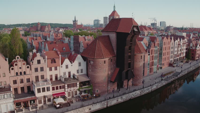 Aearial view of Gdansk old city. St Mary church, city hall tower, oldest medival port crane.  Motlawa, Poland