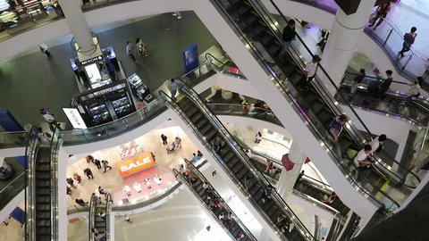 Indoor above view of escalator and people shop in Terminal Shopping Mall, It is one of the big shopping centre in Bangkok Thailand, January 01, 2019
