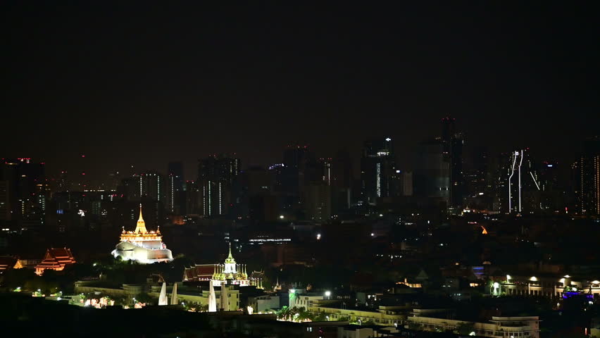 4K Fireworks display over Wat Saket with Bangkok cityscape in background