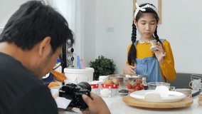 4K Pretty Asian girl vlogger recording baking tutorial promoting product, social media marketing