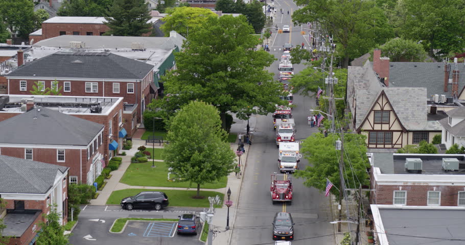 Fire Engine and Ambulances Passing Through Locust Valley Aerial View