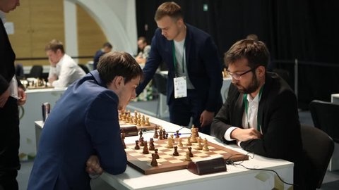 ST. PETERSBURG, RUSSIA - DECEMBER 27, 2018: Men compete during second day of King Salman World Rapid Chess Championship 2018 Open. 206 athletes take part in the competition