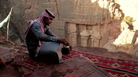 A Bedouin Man look at Petra the famous archaeological site in Jordan's southwestern desert.
