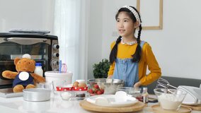 4K Pretty Asian girl vlogger recording baking tutorial promoting product, social media marketing