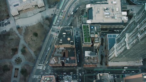 Top down aerial view of New York City streets and buildings with soft natural light. Shot on 4k RED camera on helicopter.