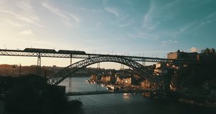 Beautiful 4K Porto city Portugal bridge  Dom Luis I Bridge aerial - a bird's eye view sunset time Ponte de Dom Luis video