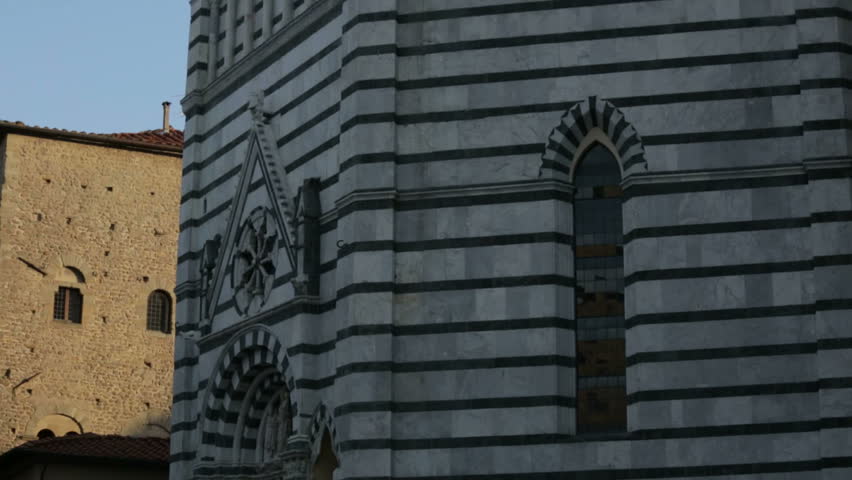 Down-up tilting shot of the octagonal shaped San Giovanni in Corte baptistery in Pistoia, Tuscany, Italy. 