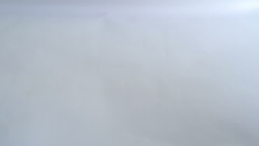 A lot of $500 and $200 mexican peso bills drop on the floor.