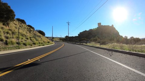 Los Angeles canyon road driving on Santa Susana Pass Road near Stoney Point and Topanga Canyon Bl in the San Fernando Valley.    