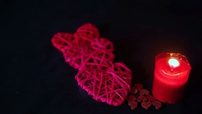 Valentine day footage decoration with candle burning and wooden love