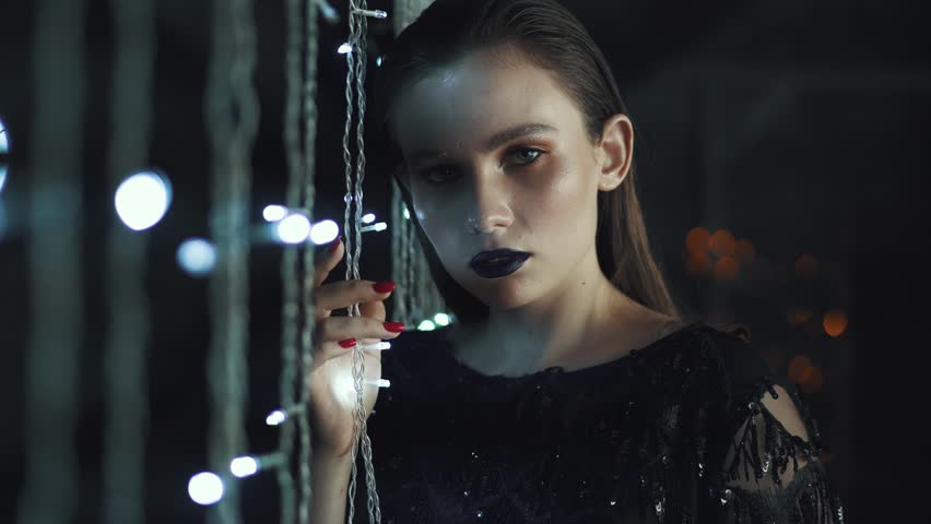 portrait of a mysterious and glamorous girl with an unusual appearance