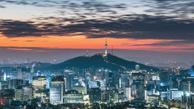 Time lapse day to night skyline of Seoul, South Korea. Zoom in
