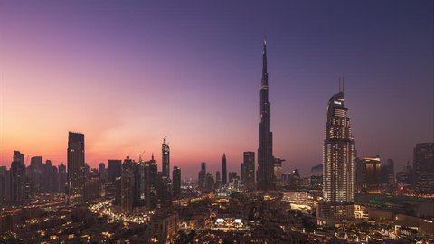 4K Timelapse - City Skyline and cityscape at sunset in Dubai. UAE