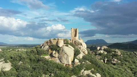 Aerial view of a beautiful ancient castle in a rural area. Castello di Pedres (Pedres Castle) Olbia, Sardinia, Italy.	