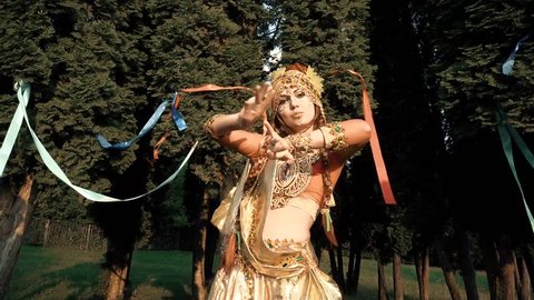 girl in costume dancing Indian