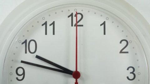 Time lapse Close-up White clock hanging on the wall Start time 09.48 Clock walking 20 minutes.