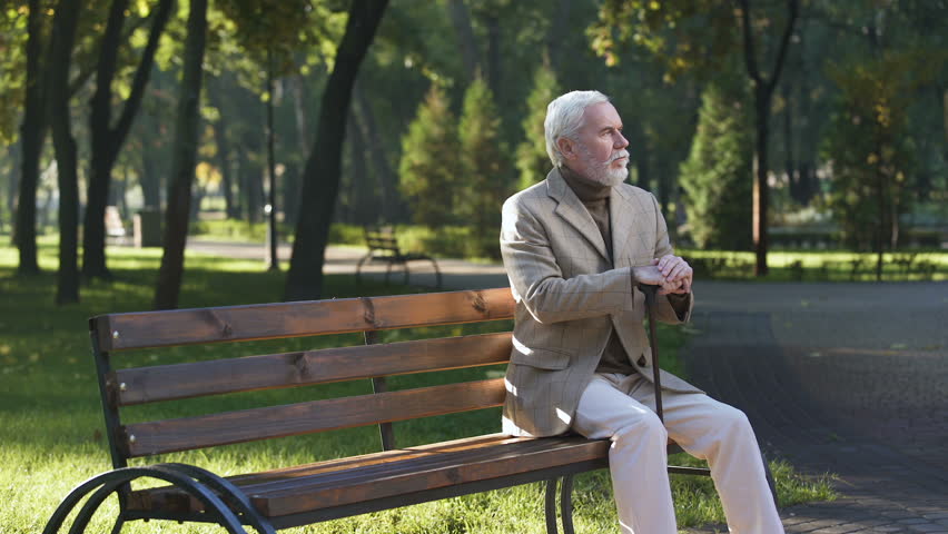 lonely upset old man sitting alone: стоковое видео (без лицензионных платеж...