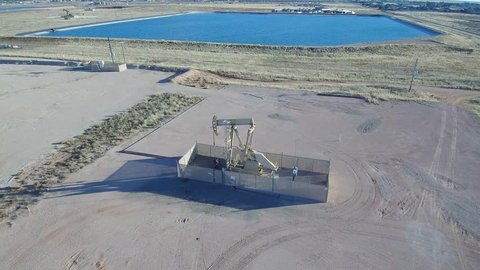 Orbital aerial video of a pump jack in west Texas