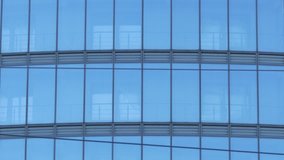 Ungraded: Corporate office building with curtain wall. Vertical panning with acceleration. Ungraded H.264 from camera without re-encoding. - Powered by Shutterstock - Get 15% off with code: PIKWIZARD15