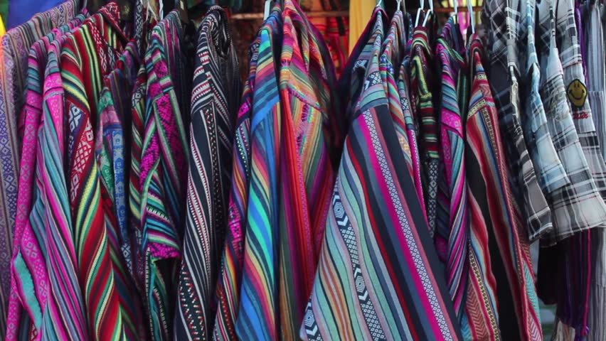 Colorful and beautiful clothes at Mexico City. Closeup shot. Street background. 