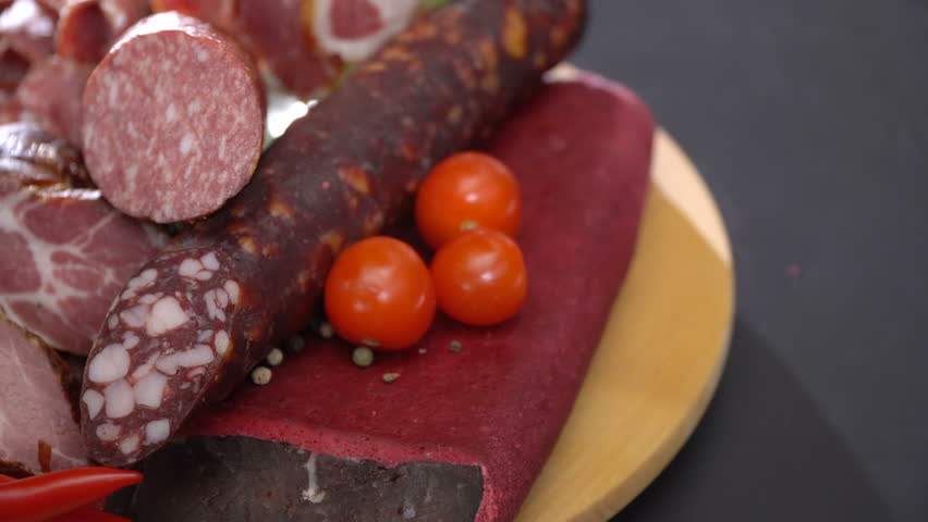 Sliced smoked sausage and ham